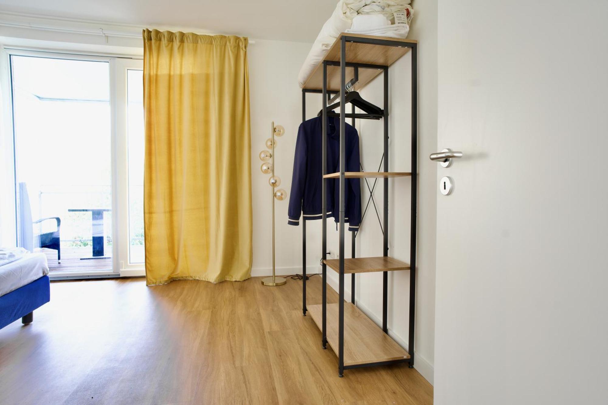 Two-Bedroom Apartment Balcony,1576695545:JPEG